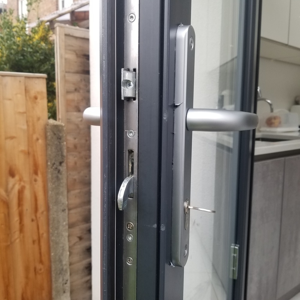 gray metalic garden double glassed door and lock